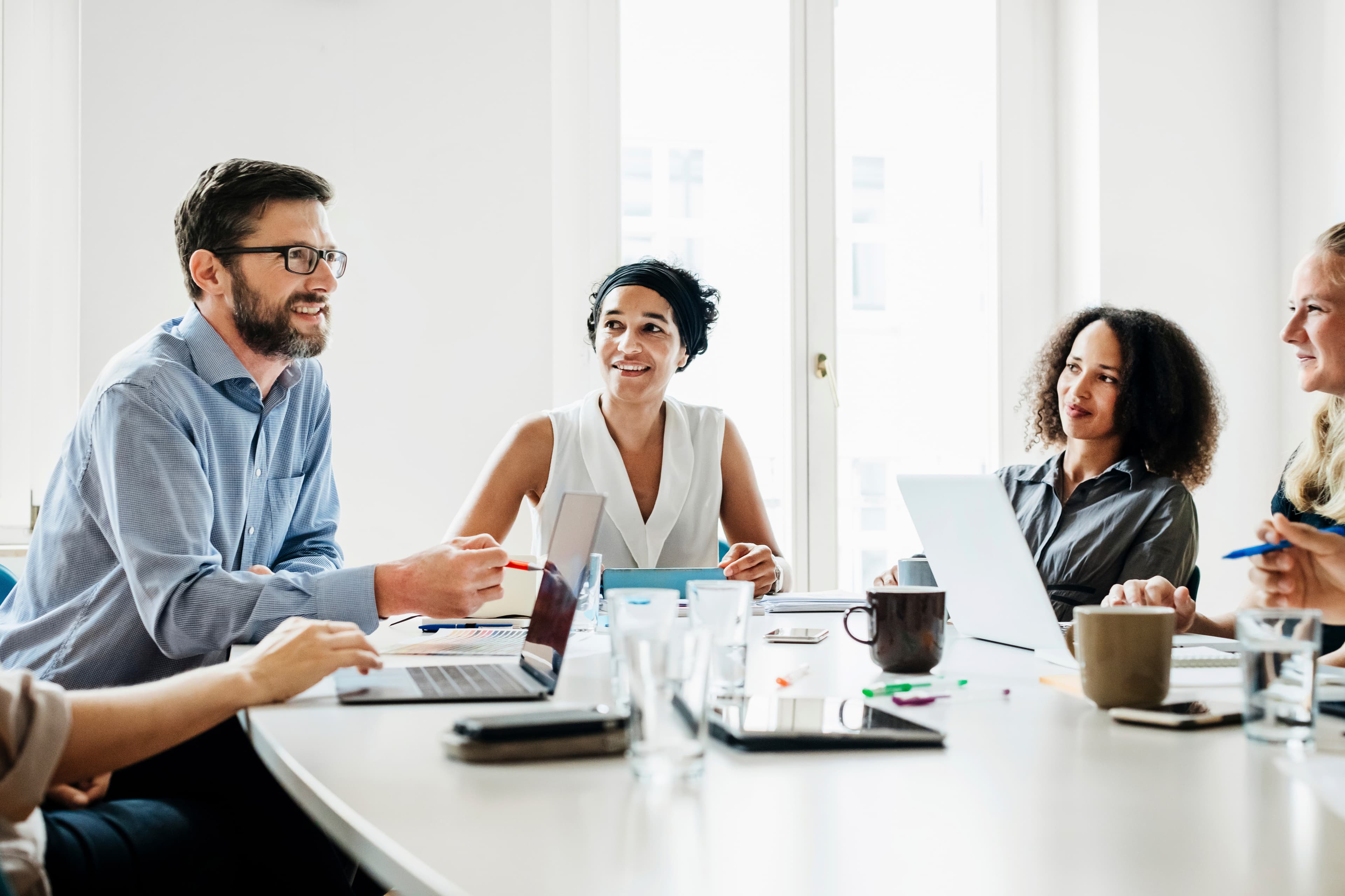 Atlantsson colleagues working together in a modern office